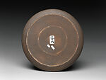 Round plate with silver and dark brown design, Kuriki Tatsusuke (Japanese, 1943–2013), Stoneware with paper-resist slip decoration and thin silver glaze, Japan