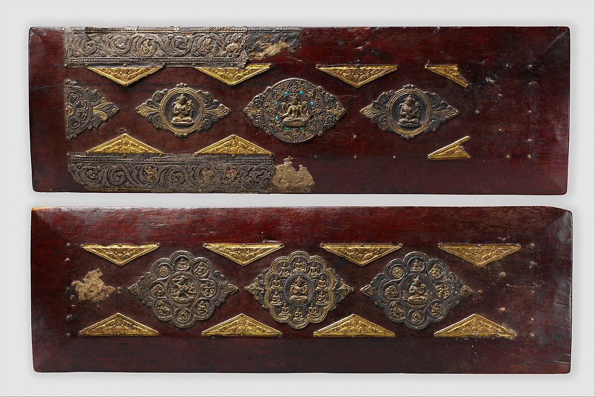 Pair of Book Covers for a Buddhist Text, Wood with traces of paint; decorative mounts of silver with gilt semiprecious stones, and gilt-copper alloy, North India and Tibet 