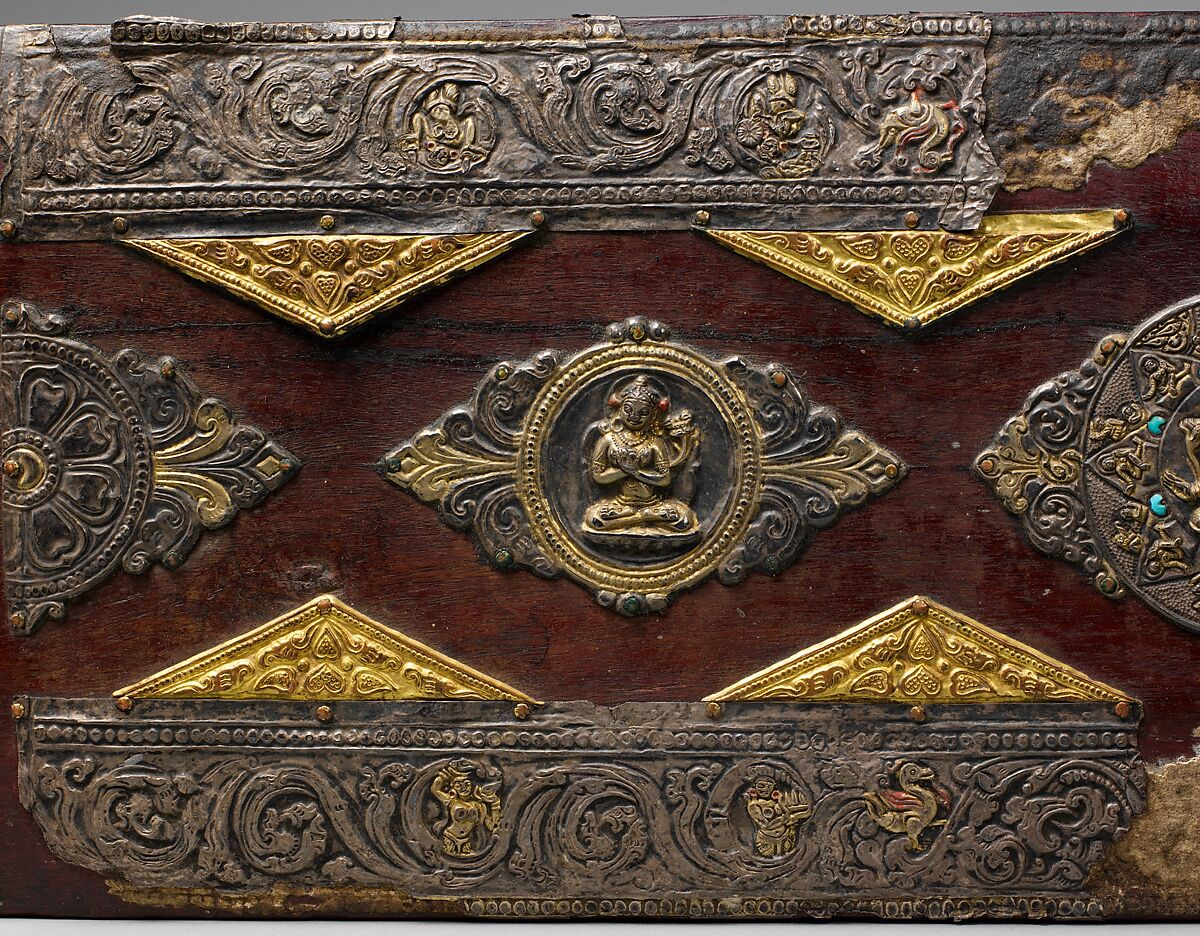 Pair of Book Covers for a Buddhist Text, Wood with traces of paint; decorative mounts of silver with gilt semiprecious stones, and gilt-copper alloy, North India and Tibet