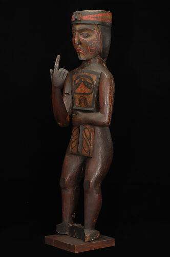 Potlatch figure (Man holding a copper)