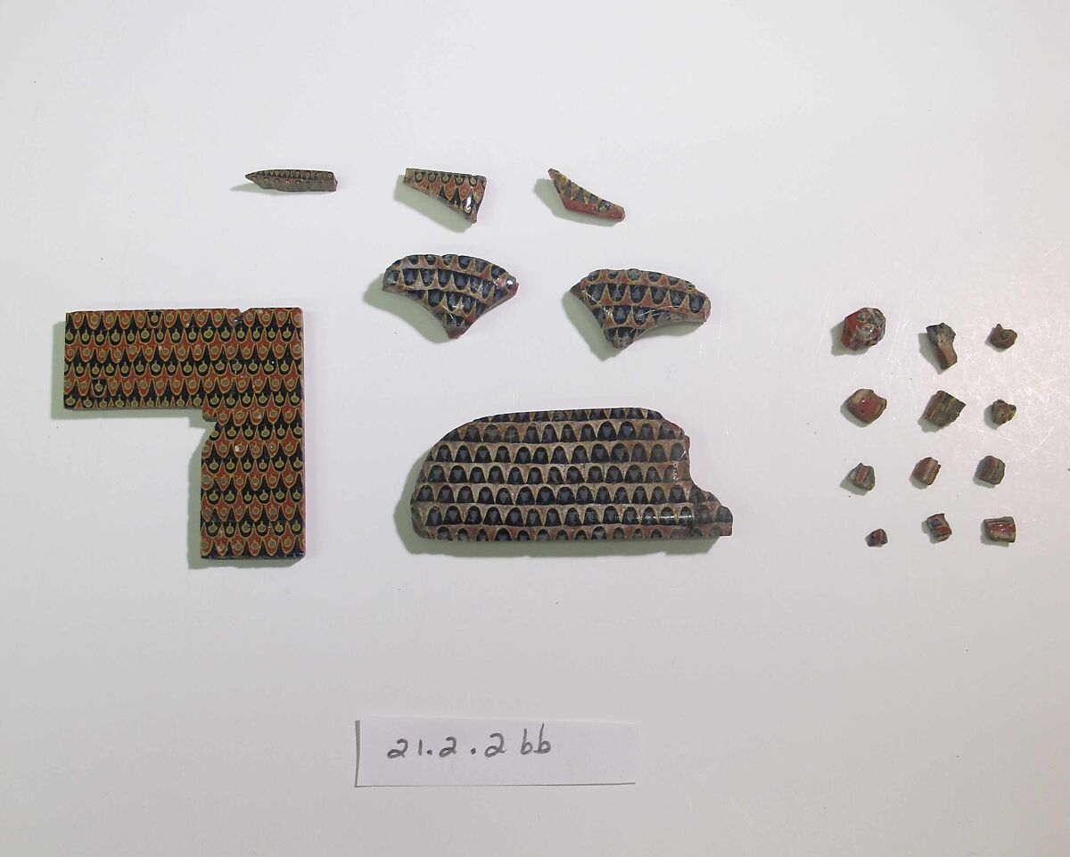 Inlay elements from shrine: box of inlays with feather pattern, Glass 