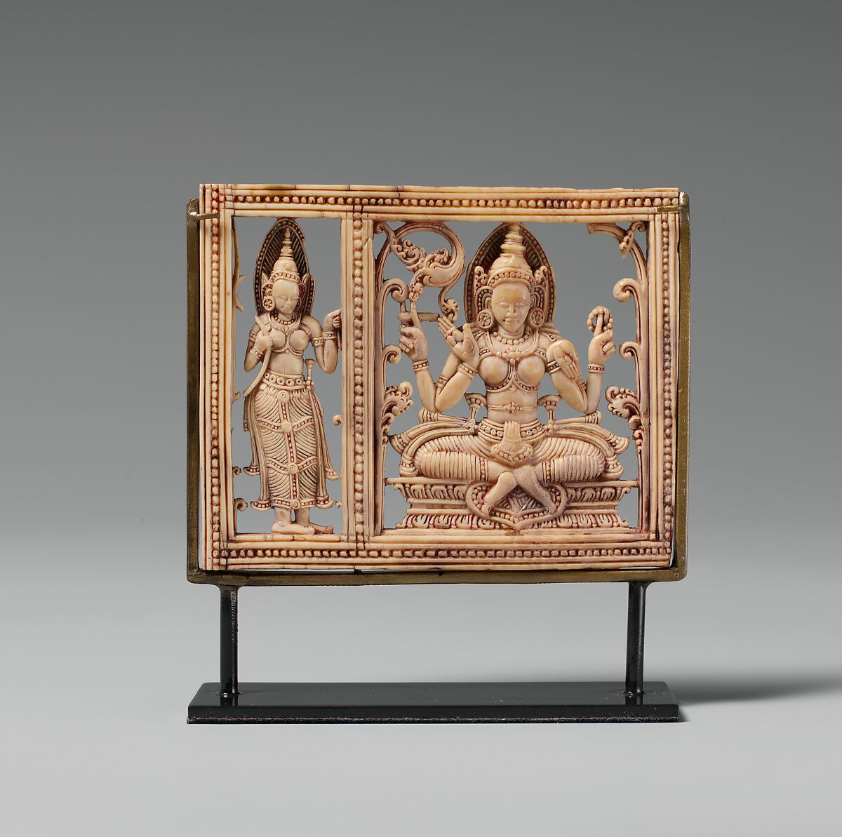 Plaque with Seated Dhanada-Tara and Attendant, Ivory, Sri Lanka 