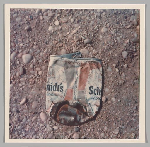 [Crushed Schmidt's Beer Can]