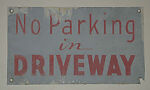 [Metal Sign: "No Parking in Driveway"], Unknown, Ink on metal