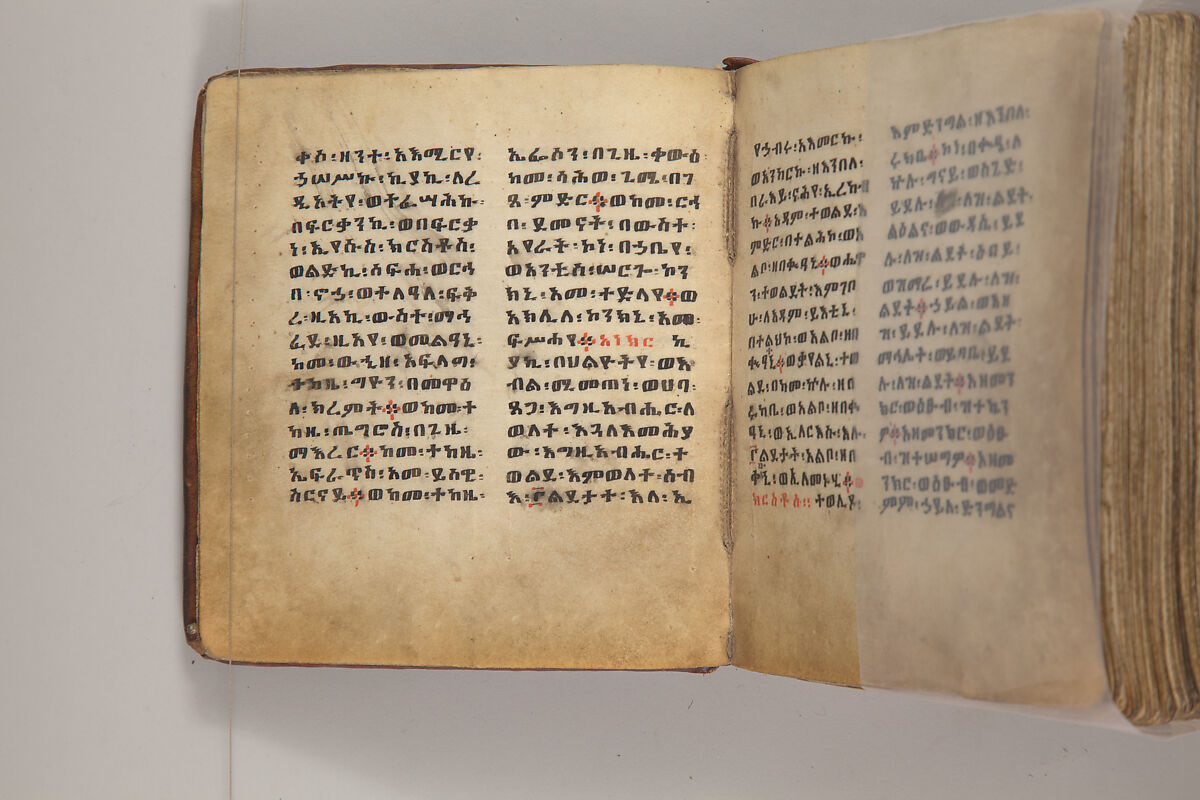 Arganonä Maryam (The Organ of Mary) prayer book, Attributed to Baselyos, also known as "The Ground Hornbill Master" (active late 17th century, Lasta region, Ethiopia), Parchment, pigment ink, wood, leather, fiber