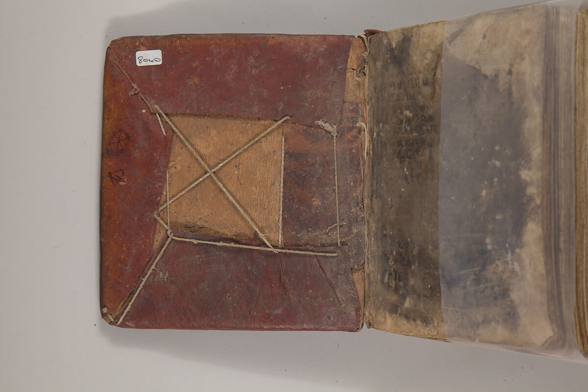 Arganonä Maryam (The Organ of Mary) prayer book, Attributed to Baselyos, also known as "The Ground Hornbill Master" (active late 17th century, Lasta region, Ethiopia), Parchment, pigment ink, wood, leather, fiber