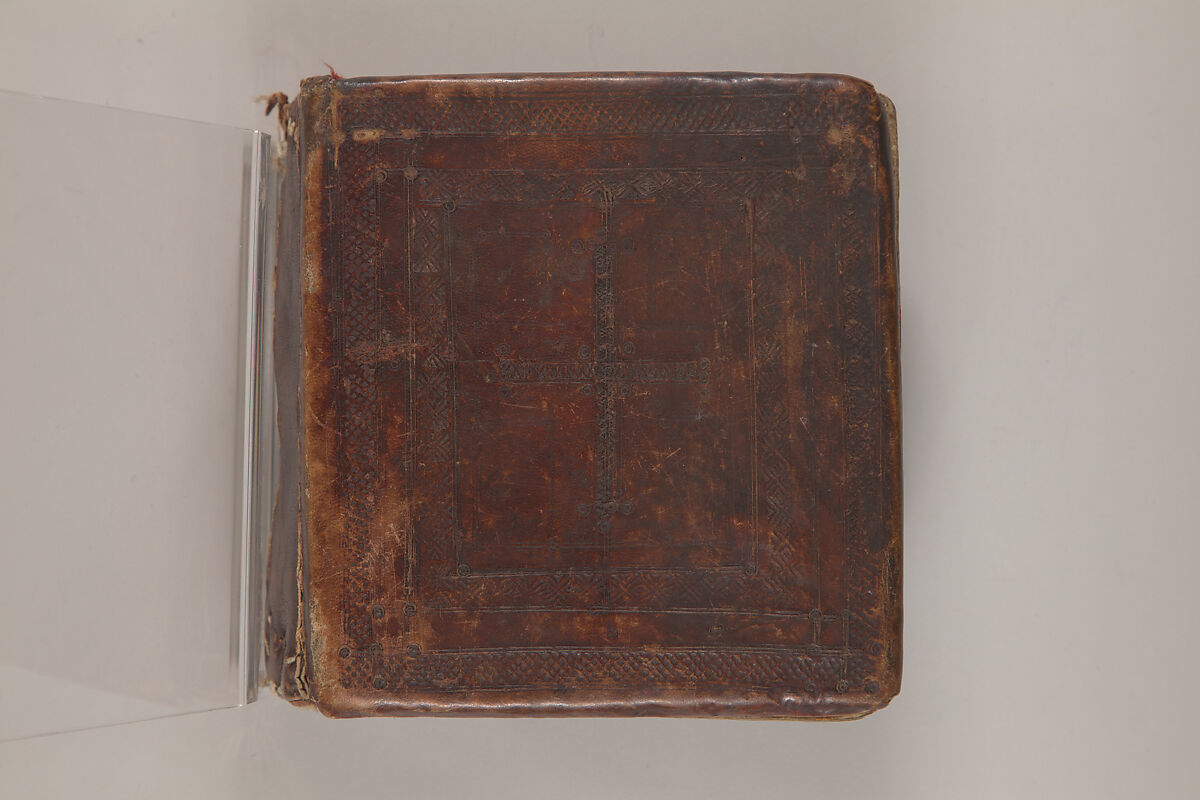 Arganonä Maryam (The Organ of Mary) prayer book, Attributed to Baselyos, also known as "The Ground Hornbill Master" (active late 17th century, Lasta region, Ethiopia), Parchment, pigment ink, wood, leather, fiber