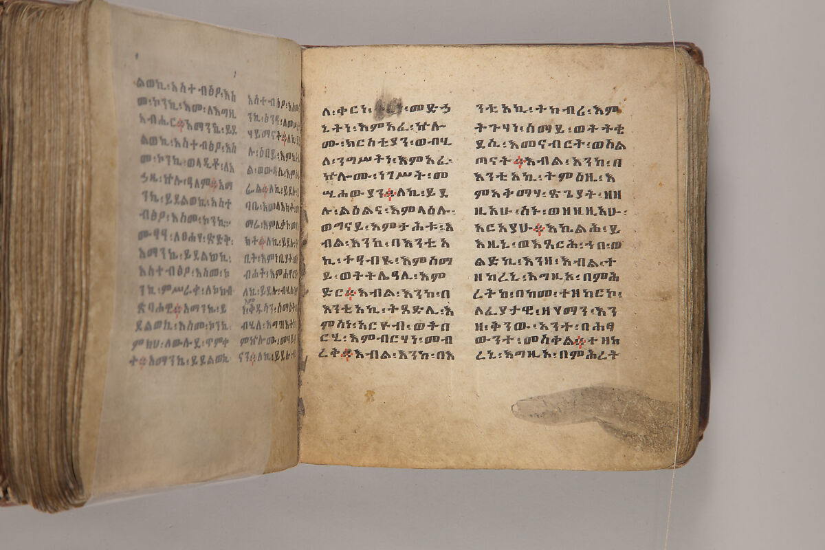 Arganonä Maryam (The Organ of Mary) prayer book, Attributed to Baselyos, also known as "The Ground Hornbill Master" (active late 17th century, Lasta region, Ethiopia), Parchment, pigment ink, wood, leather, fiber