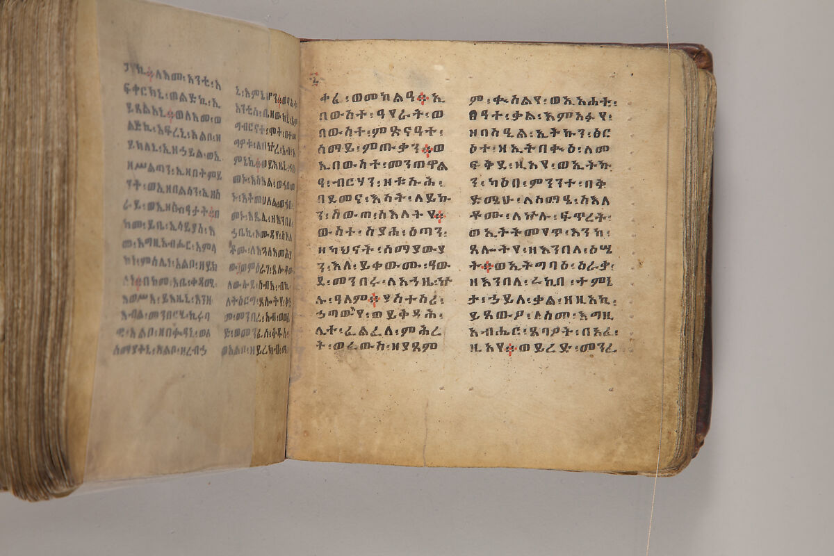 Arganonä Maryam (The Organ of Mary) prayer book, Attributed to Baselyos, also known as "The Ground Hornbill Master" (active late 17th century, Lasta region, Ethiopia), Parchment, pigment ink, wood, leather, fiber