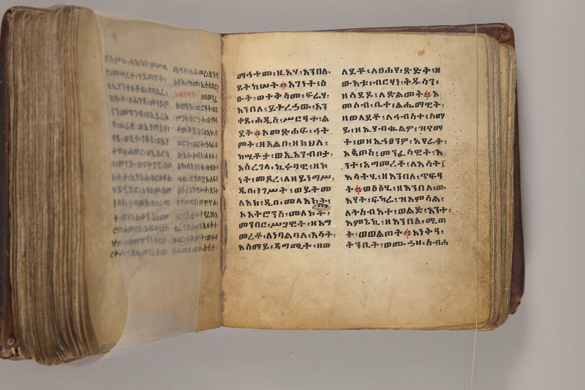 Arganonä Maryam (The Organ of Mary) prayer book, Attributed to Baselyos, also known as "The Ground Hornbill Master" (active late 17th century, Lasta region, Ethiopia), Parchment, pigment ink, wood, leather, fiber