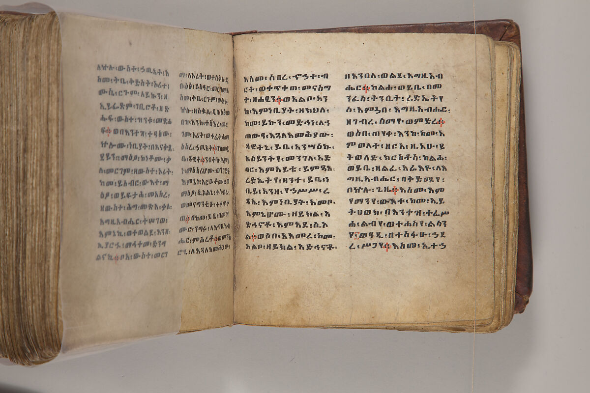 Arganonä Maryam (The Organ of Mary) prayer book, Attributed to Baselyos, also known as "The Ground Hornbill Master" (active late 17th century, Lasta region, Ethiopia), Parchment, pigment ink, wood, leather, fiber