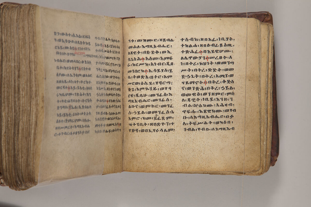Arganonä Maryam (The Organ of Mary) prayer book, Attributed to Baselyos, also known as "The Ground Hornbill Master" (active late 17th century, Lasta region, Ethiopia), Parchment, pigment ink, wood, leather, fiber