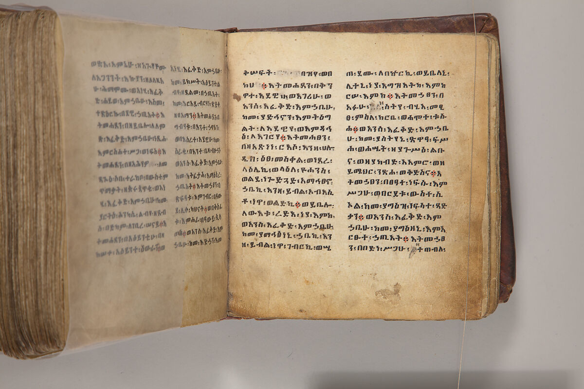 Arganonä Maryam (The Organ of Mary) prayer book, Attributed to Baselyos, also known as "The Ground Hornbill Master" (active late 17th century, Lasta region, Ethiopia), Parchment, pigment ink, wood, leather, fiber
