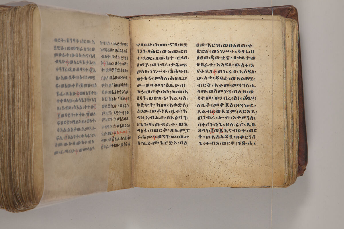 Arganonä Maryam (The Organ of Mary) prayer book, Attributed to Baselyos, also known as "The Ground Hornbill Master" (active late 17th century, Lasta region, Ethiopia), Parchment, pigment ink, wood, leather, fiber