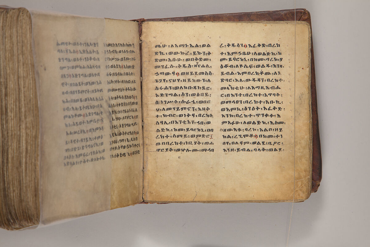 Arganonä Maryam (The Organ of Mary) prayer book, Attributed to Baselyos, also known as "The Ground Hornbill Master" (active late 17th century, Lasta region, Ethiopia), Parchment, pigment ink, wood, leather, fiber