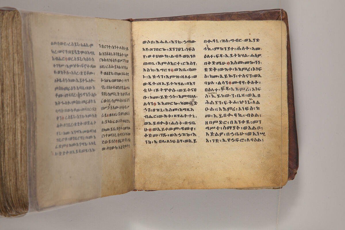 Arganonä Maryam (The Organ of Mary) prayer book, Attributed to Baselyos, also known as "The Ground Hornbill Master" (active late 17th century, Lasta region, Ethiopia), Parchment, pigment ink, wood, leather, fiber