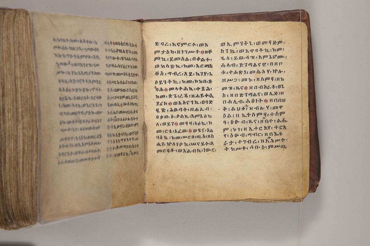 Arganonä Maryam (The Organ of Mary) prayer book, Attributed to Baselyos, also known as "The Ground Hornbill Master" (active late 17th century, Lasta region, Ethiopia), Parchment, pigment ink, wood, leather, fiber