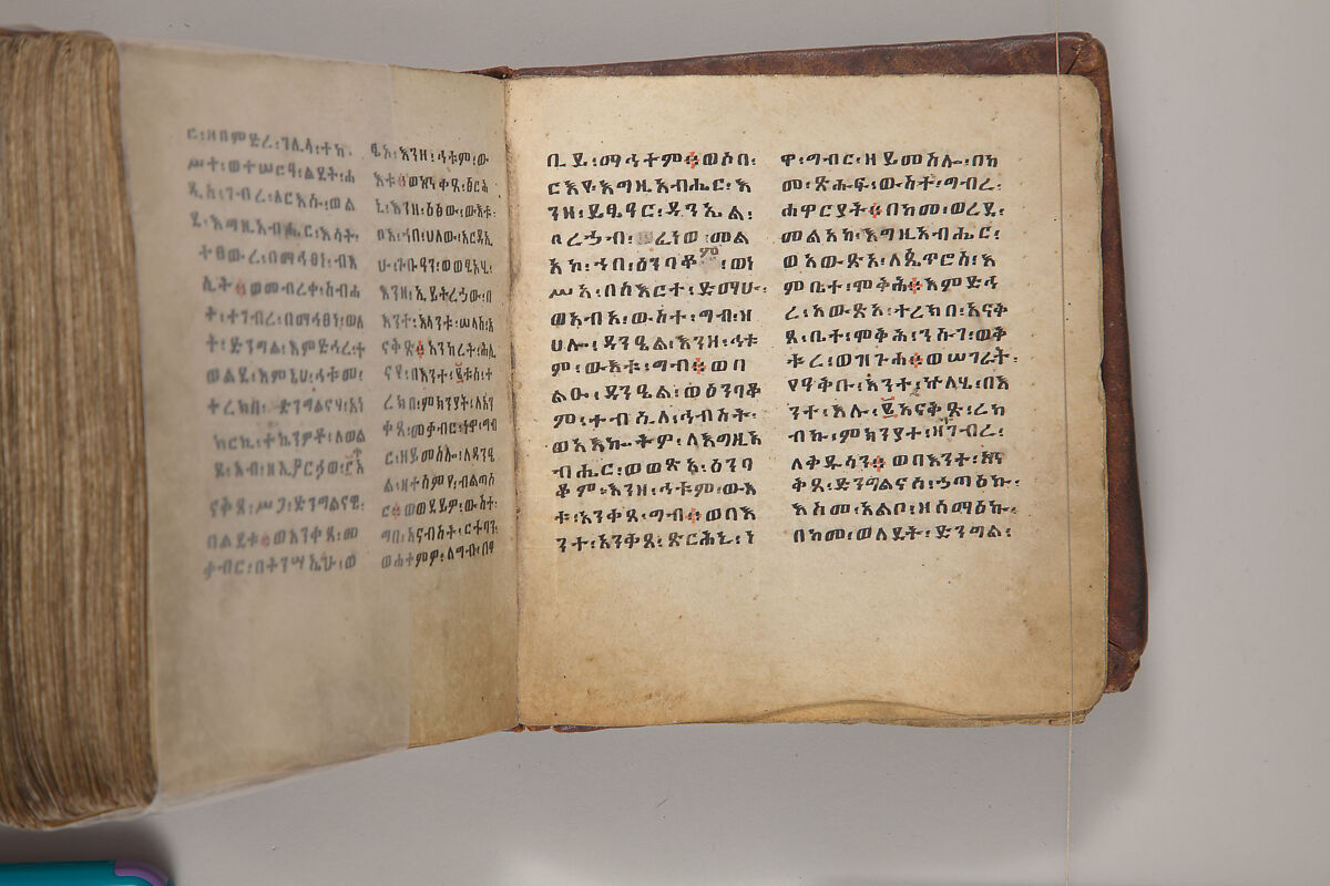 Arganonä Maryam (The Organ of Mary) prayer book, Attributed to Baselyos, also known as "The Ground Hornbill Master" (active late 17th century, Lasta region, Ethiopia), Parchment, pigment ink, wood, leather, fiber