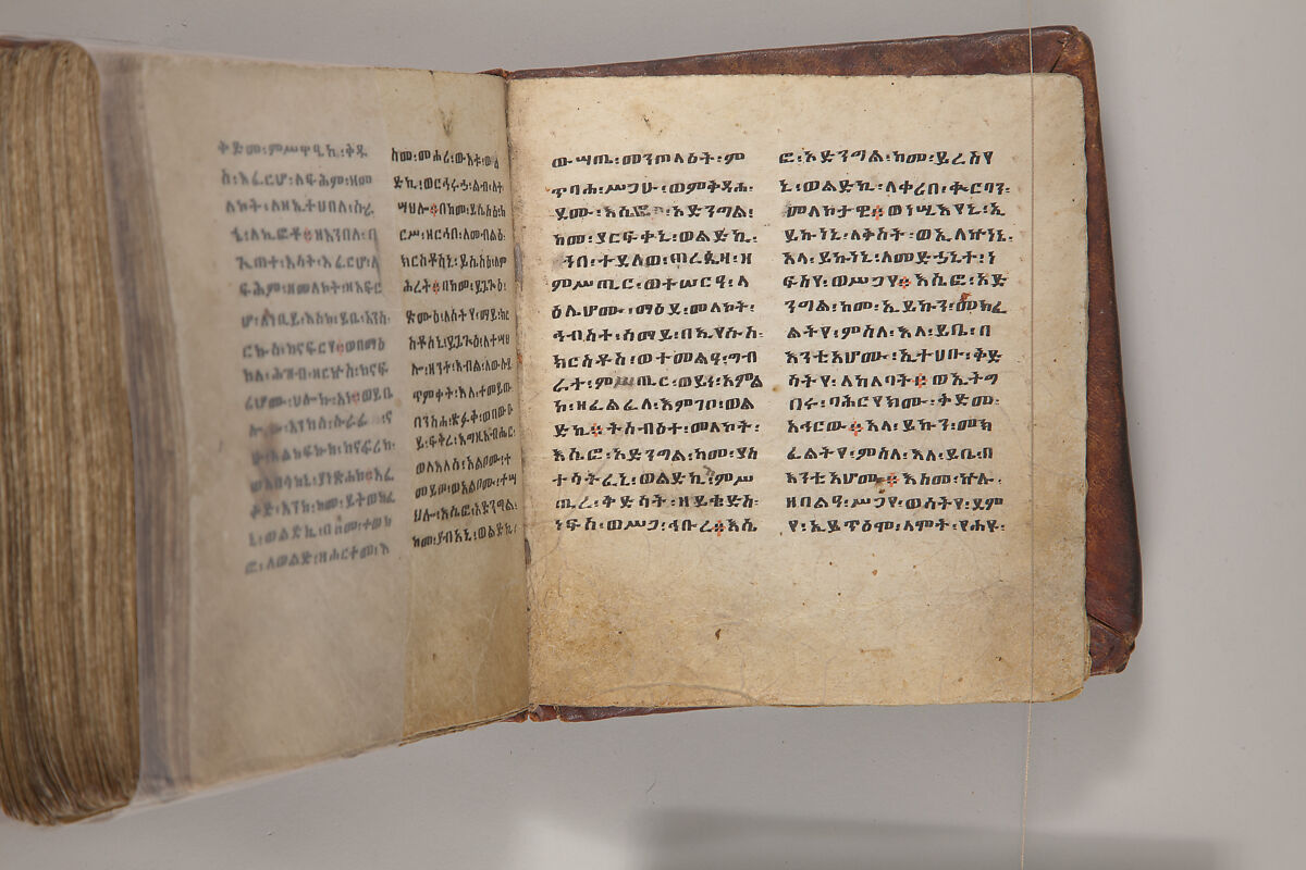 Arganonä Maryam (The Organ of Mary) prayer book, Attributed to Baselyos, also known as "The Ground Hornbill Master" (active late 17th century, Lasta region, Ethiopia), Parchment, pigment ink, wood, leather, fiber