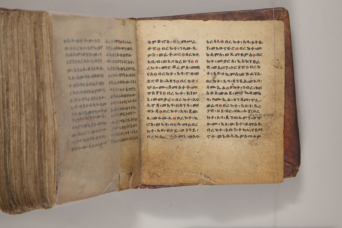 Arganonä Maryam (The Organ of Mary) prayer book, Attributed to Baselyos, also known as "The Ground Hornbill Master" (active late 17th century, Lasta region, Ethiopia), Parchment, pigment ink, wood, leather, fiber