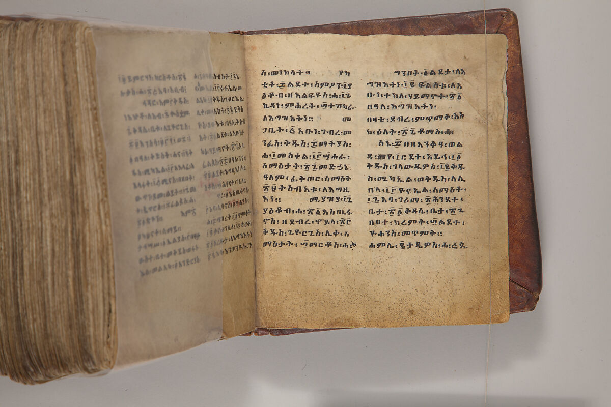 Arganonä Maryam (The Organ of Mary) prayer book, Attributed to Baselyos, also known as "The Ground Hornbill Master" (active late 17th century, Lasta region, Ethiopia), Parchment, pigment ink, wood, leather, fiber