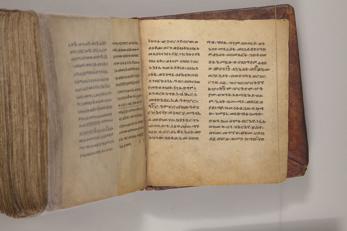 Arganonä Maryam (The Organ of Mary) prayer book, Attributed to Baselyos, also known as "The Ground Hornbill Master" (active late 17th century, Lasta region, Ethiopia), Parchment, pigment ink, wood, leather, fiber