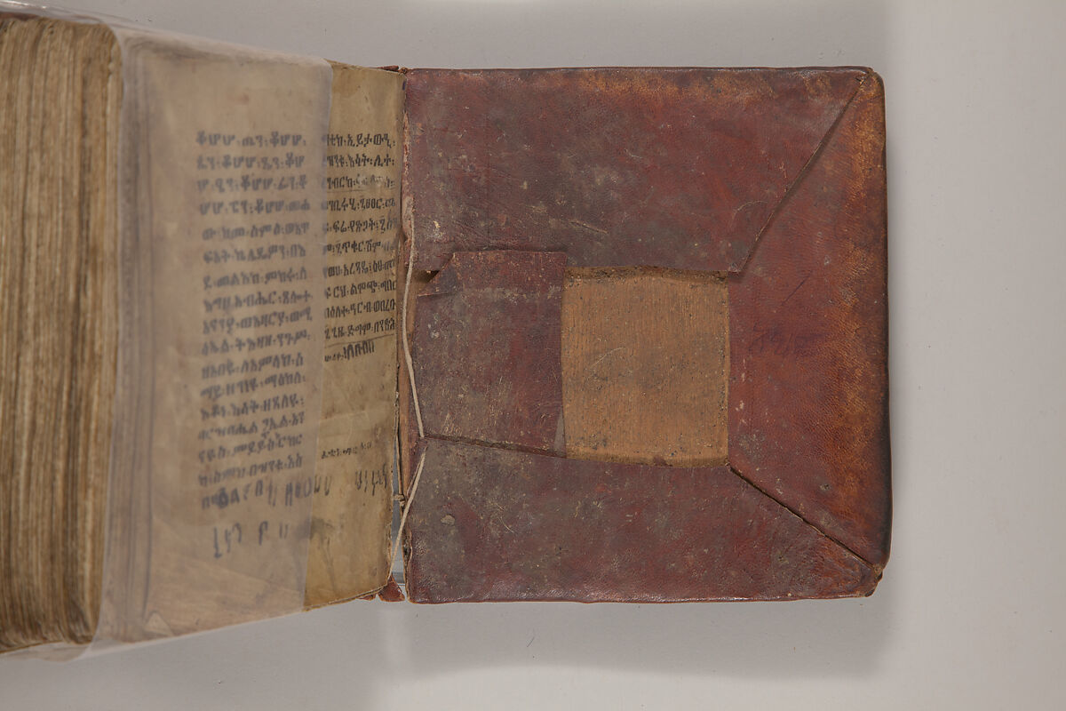 Arganonä Maryam (The Organ of Mary) prayer book, Attributed to Baselyos, also known as "The Ground Hornbill Master" (active late 17th century, Lasta region, Ethiopia), Parchment, pigment ink, wood, leather, fiber