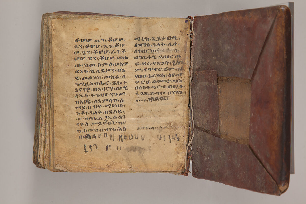 Arganonä Maryam (The Organ of Mary) prayer book, Attributed to Baselyos, also known as "The Ground Hornbill Master" (active late 17th century, Lasta region, Ethiopia), Parchment, pigment ink, wood, leather, fiber