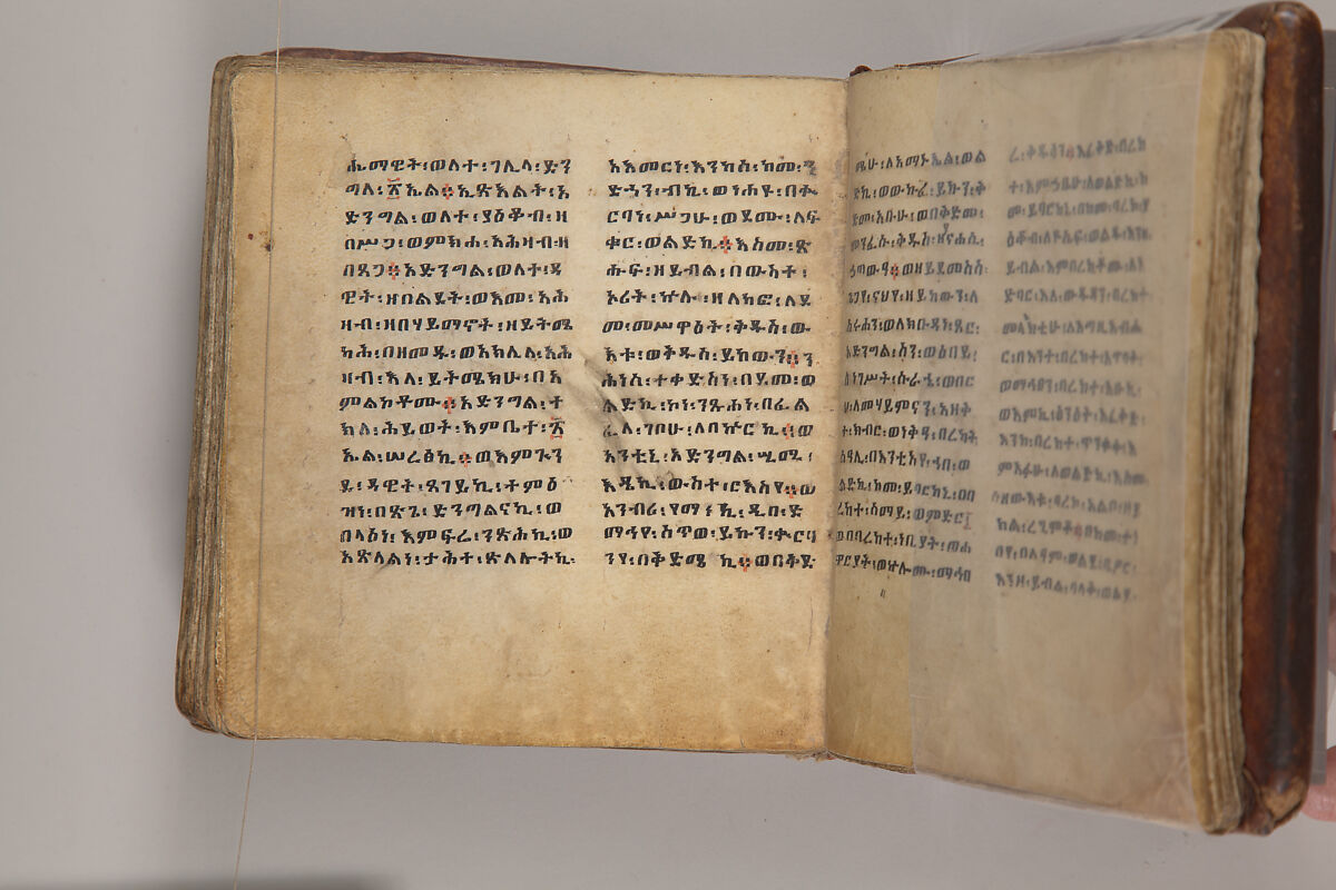 Arganonä Maryam (The Organ of Mary) prayer book, Attributed to Baselyos, also known as "The Ground Hornbill Master" (active late 17th century, Lasta region, Ethiopia), Parchment, pigment ink, wood, leather, fiber