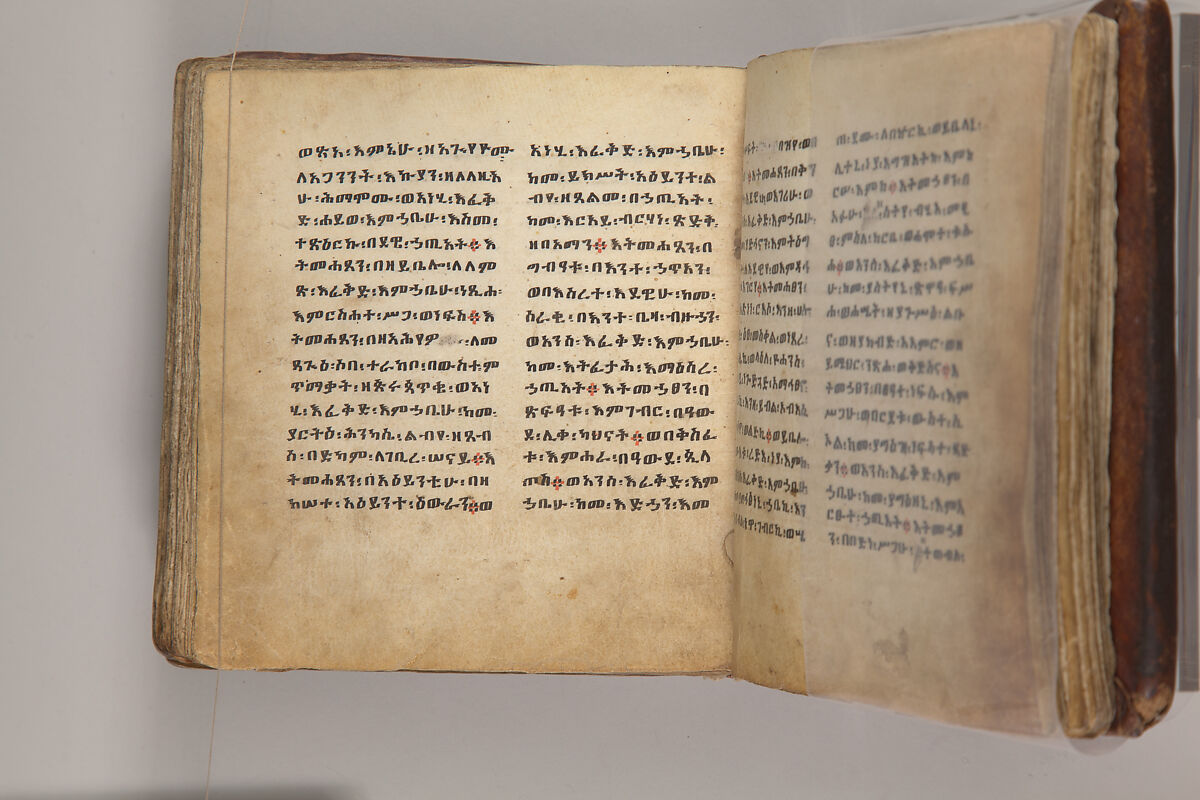 Arganonä Maryam (The Organ of Mary) prayer book, Attributed to Baselyos, also known as "The Ground Hornbill Master" (active late 17th century, Lasta region, Ethiopia), Parchment, pigment ink, wood, leather, fiber