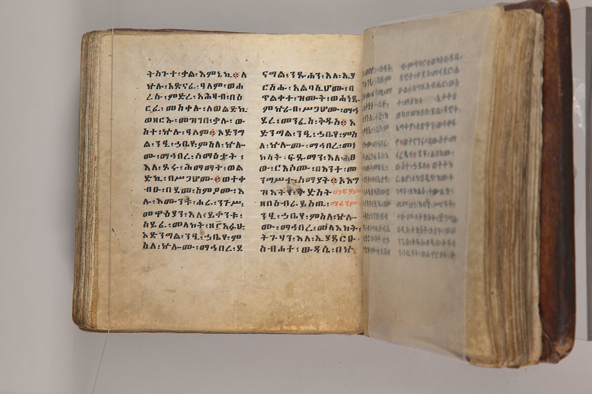 Arganonä Maryam (The Organ of Mary) prayer book, Attributed to Baselyos, also known as "The Ground Hornbill Master" (active late 17th century, Lasta region, Ethiopia), Parchment, pigment ink, wood, leather, fiber