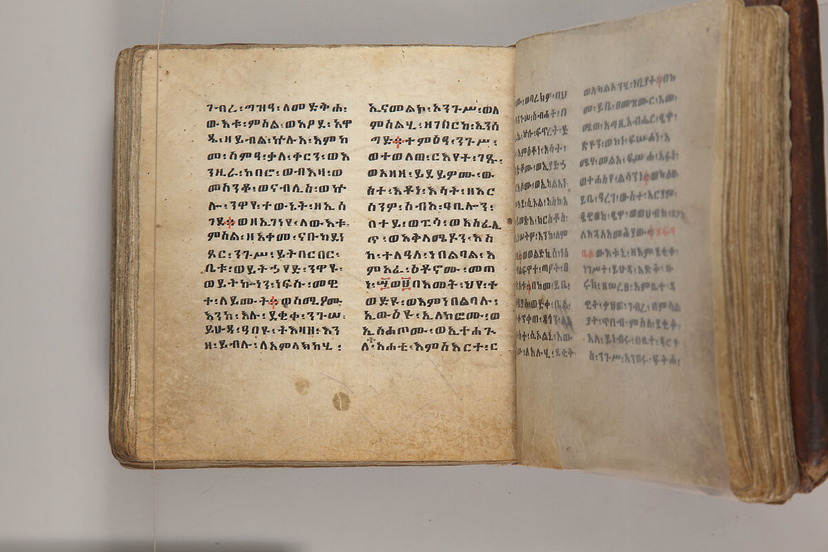Arganonä Maryam (The Organ of Mary) prayer book, Attributed to Baselyos, also known as "The Ground Hornbill Master" (active late 17th century, Lasta region, Ethiopia), Parchment, pigment ink, wood, leather, fiber