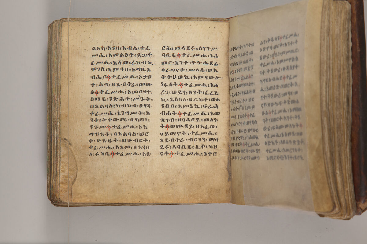 Arganonä Maryam (The Organ of Mary) prayer book, Attributed to Baselyos, also known as "The Ground Hornbill Master" (active late 17th century, Lasta region, Ethiopia), Parchment, pigment ink, wood, leather, fiber