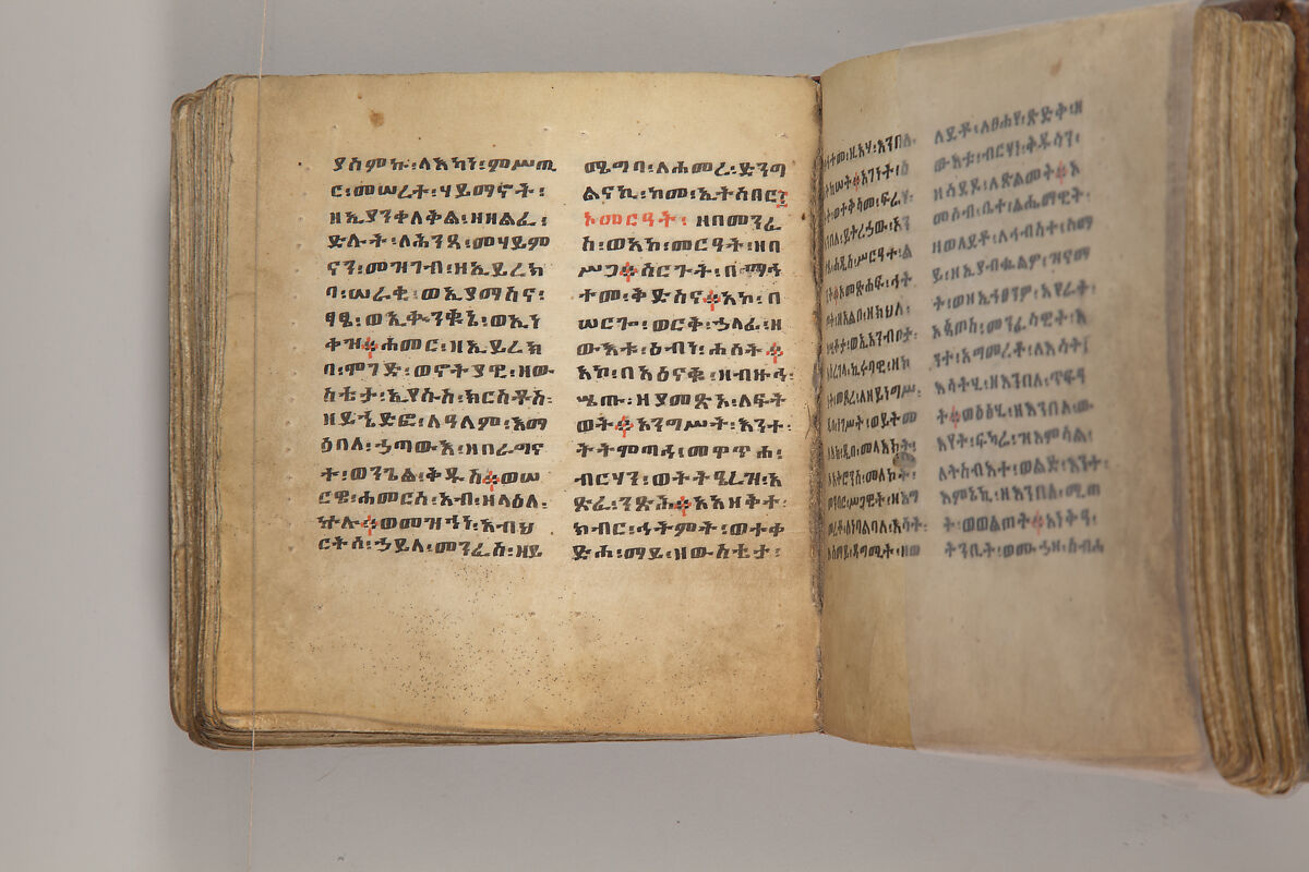 Arganonä Maryam (The Organ of Mary) prayer book, Attributed to Baselyos, also known as "The Ground Hornbill Master" (active late 17th century, Lasta region, Ethiopia), Parchment, pigment ink, wood, leather, fiber