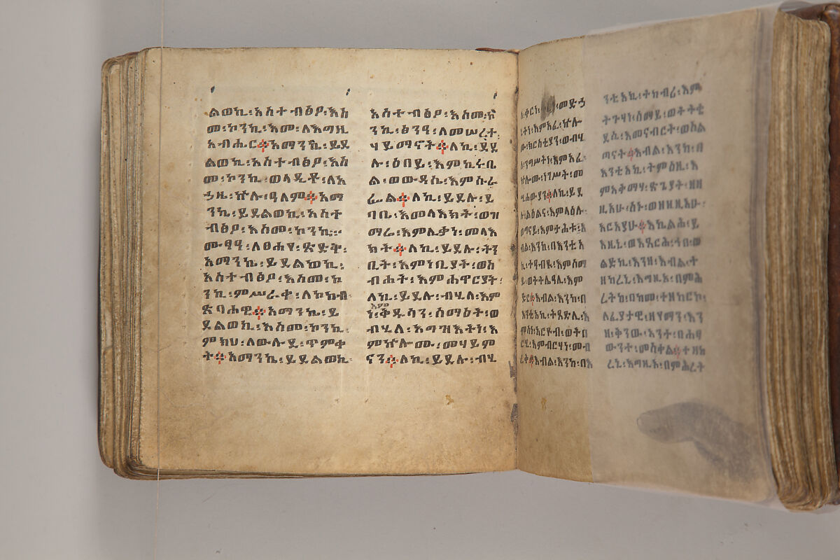 Arganonä Maryam (The Organ of Mary) prayer book, Attributed to Baselyos, also known as "The Ground Hornbill Master" (active late 17th century, Lasta region, Ethiopia), Parchment, pigment ink, wood, leather, fiber