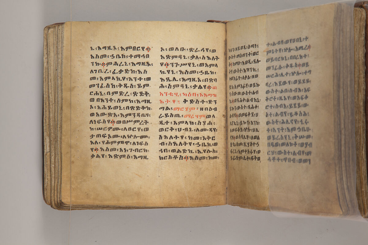 Arganonä Maryam (The Organ of Mary) prayer book, Attributed to Baselyos, also known as "The Ground Hornbill Master" (active late 17th century, Lasta region, Ethiopia), Parchment, pigment ink, wood, leather, fiber