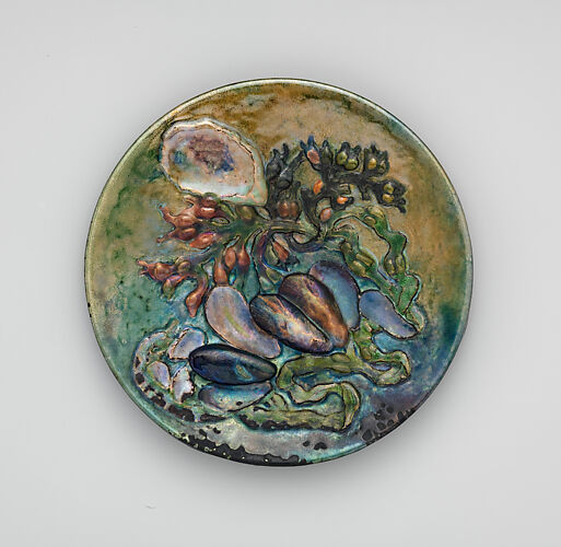 Plaque with mussel and oyster shells and seaweed