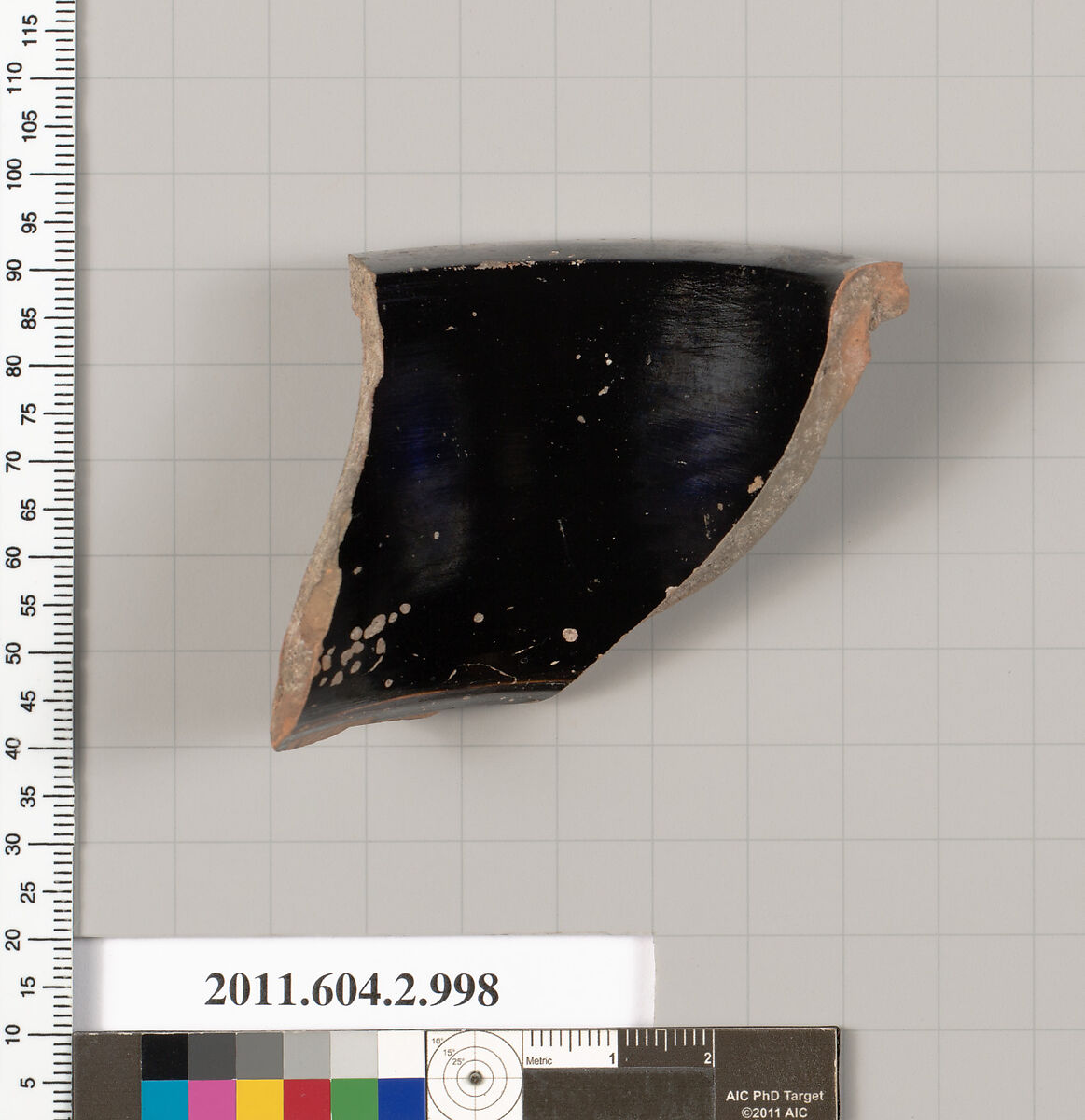 Terracotta fragment of an oinochoe: olpe (jug), Terracotta, Greek, Attic