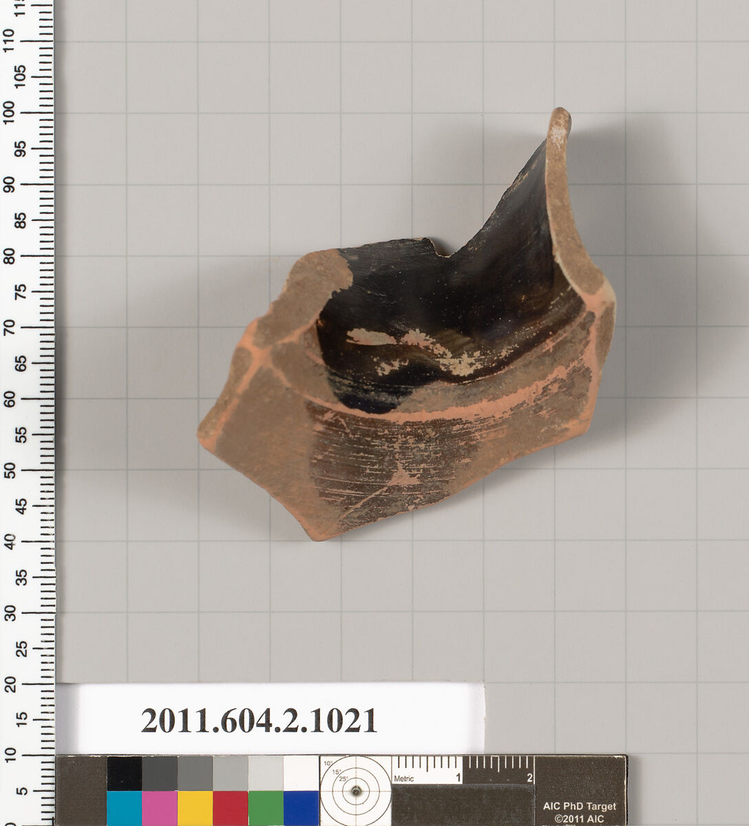 Terracotta fragment of an oinochoe (jug), Terracotta, Greek, Attic