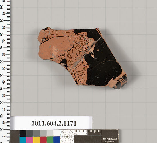 Terracotta fragment of a lekanis lid (covered dish)