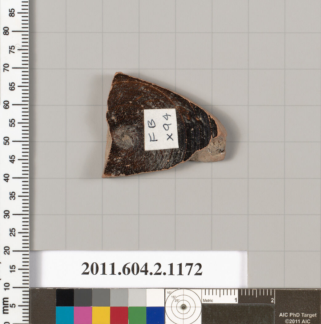 Terracotta fragment of a lekanis lid (covered dish), Terracotta, Greek, Attic