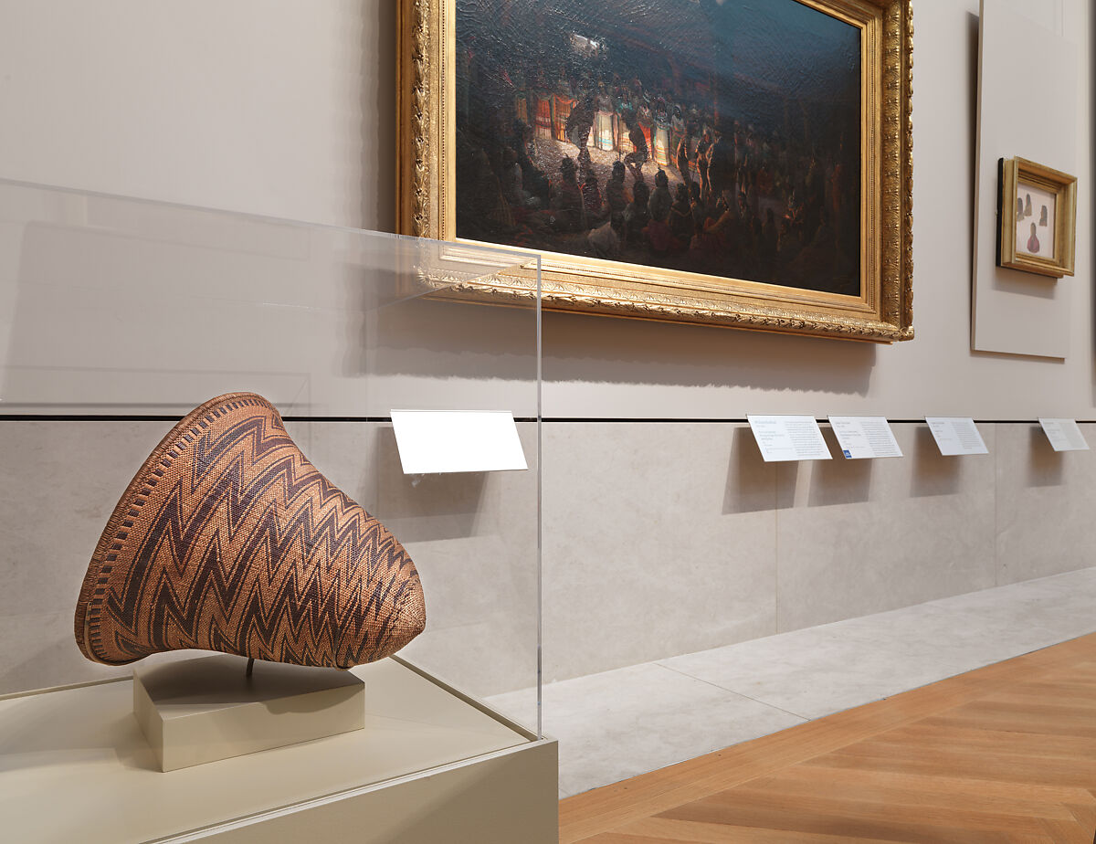 Diagonally twined carrying basket, Willow shoot foundation, sedge root warp, redbud shoot weft, coiled-on oak rim rod and split wild grape vine rim wrap, Pomo, Native American