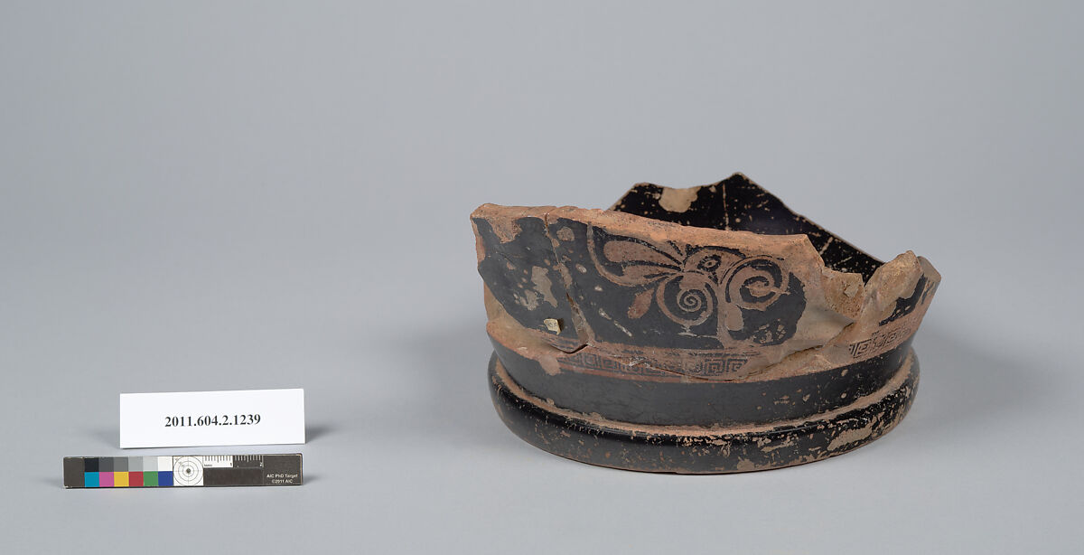 Terracotta fragment of a skyphos (deep drinking cup), Terracotta, Greek, Attic 