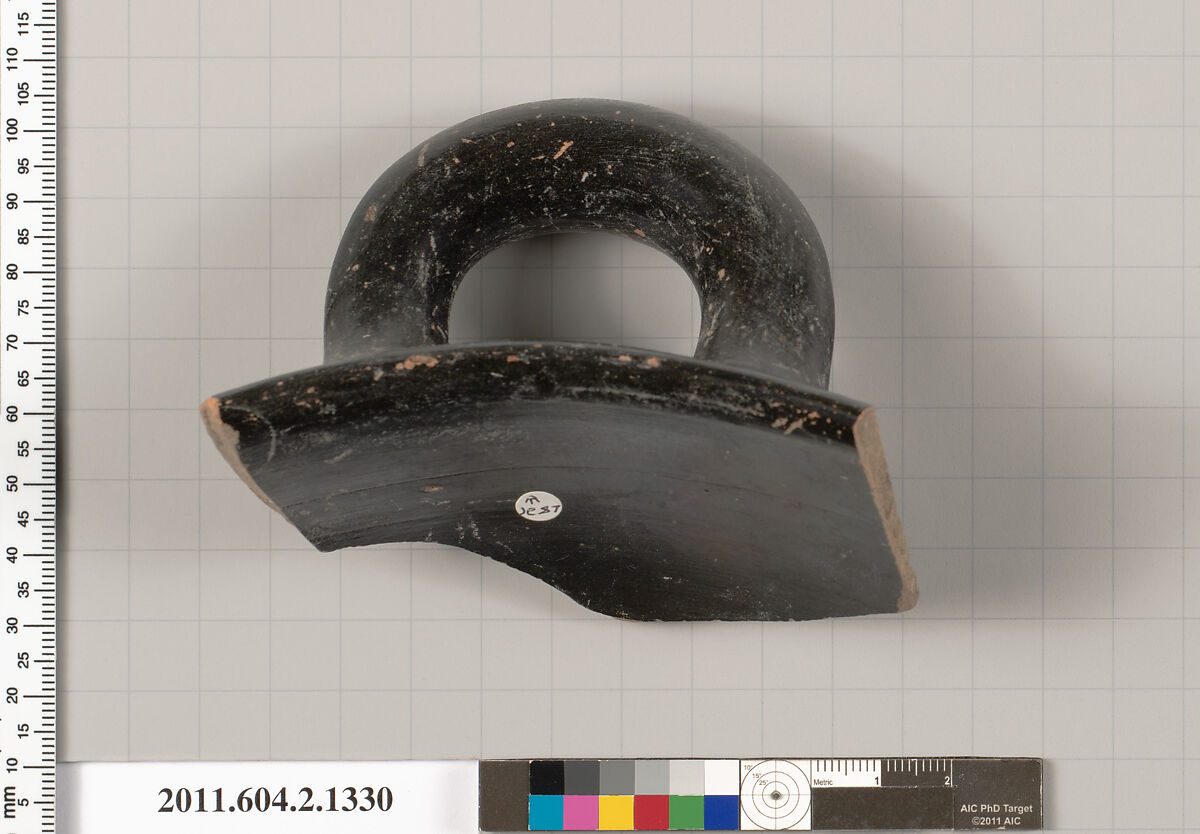 Terracotta fragment of a skyphos (deep drinking cup), Terracotta, Greek, Attic