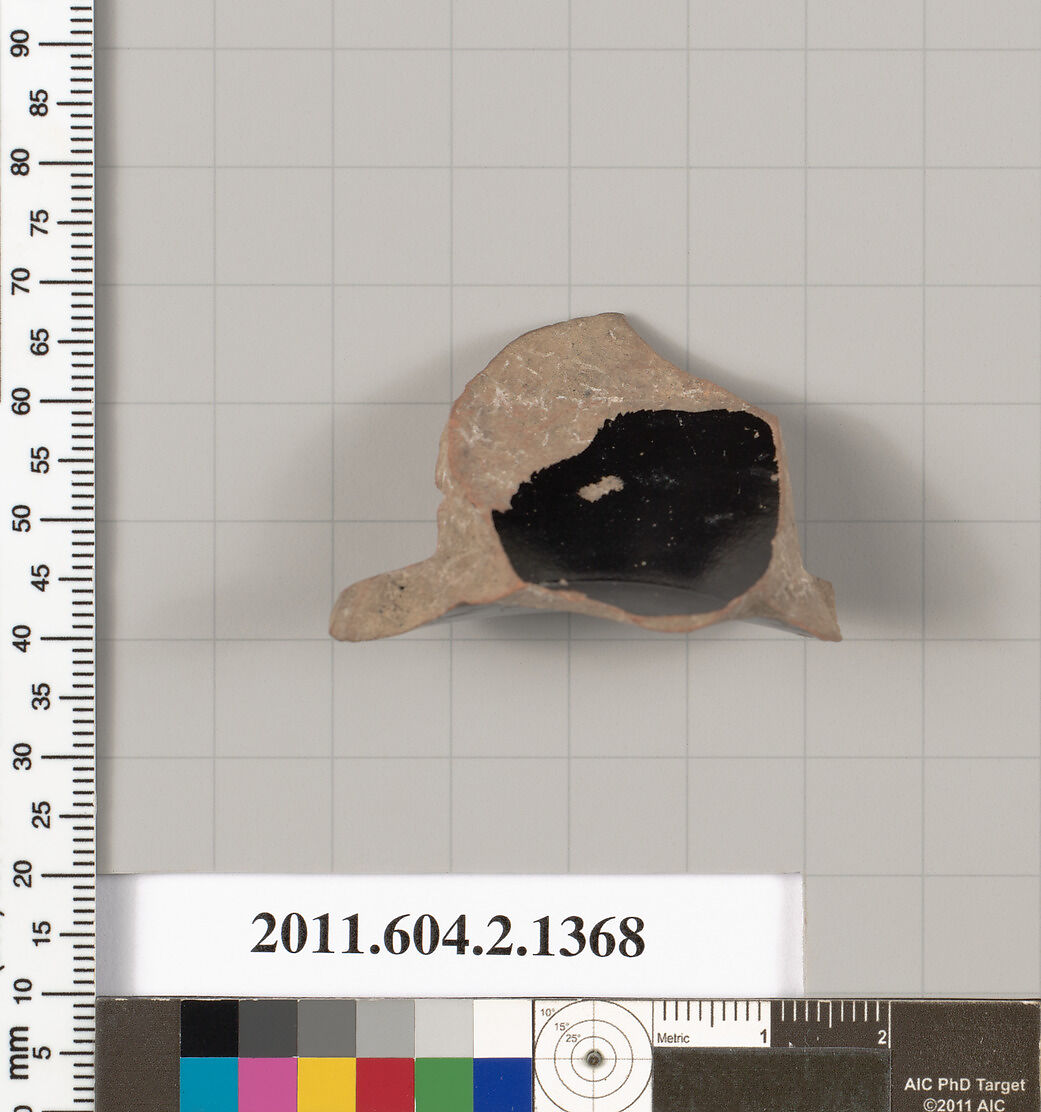 Terracotta fragment of a skyphos (deep drinking cup), Terracotta, Greek, Attic