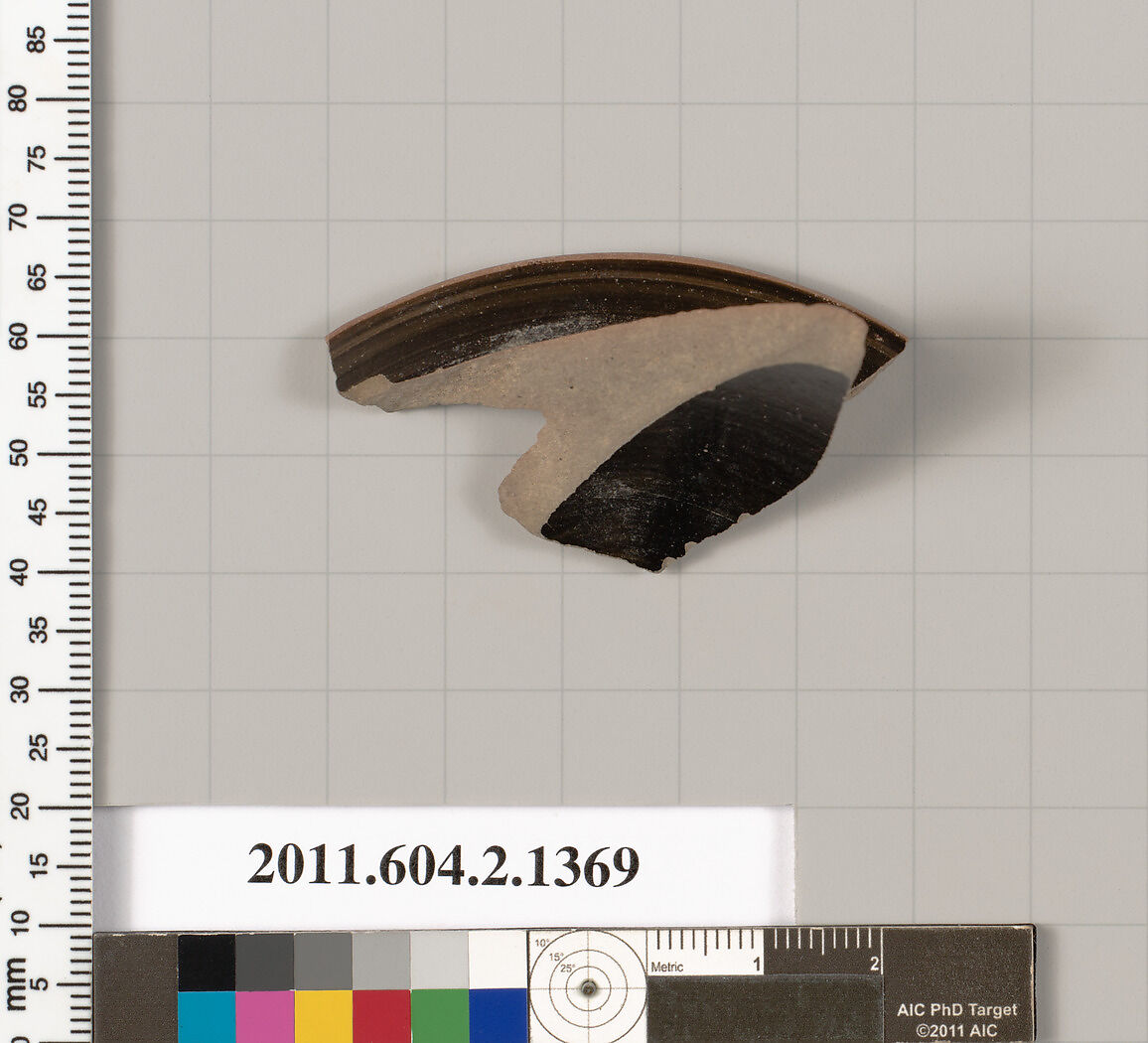 Terracotta fragment of a skyphos (deep drinking cup), Terracotta, Greek, Attic