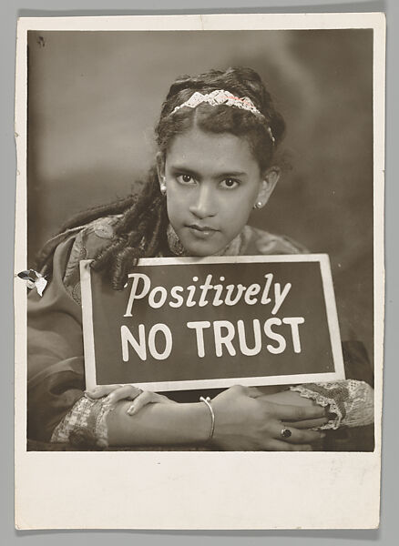 [Young Woman Cradling "Positively NO TRUST" Sign], James Van Der Zee (American, Lenox, Massachusetts 1886–1983 Washington, D.C.), Gelatin silver print 