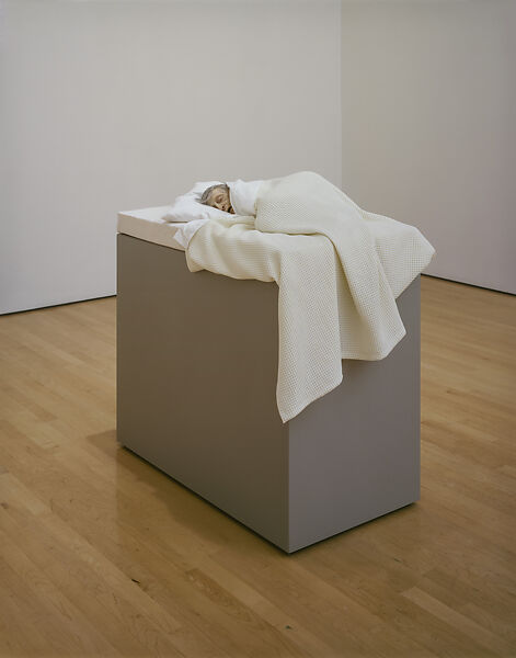 Old Woman in Bed, Ron Mueck (Australian, born 1958), silicone rubber, polyester resin, cotton, polyurethane foam, polyester and oil paint 