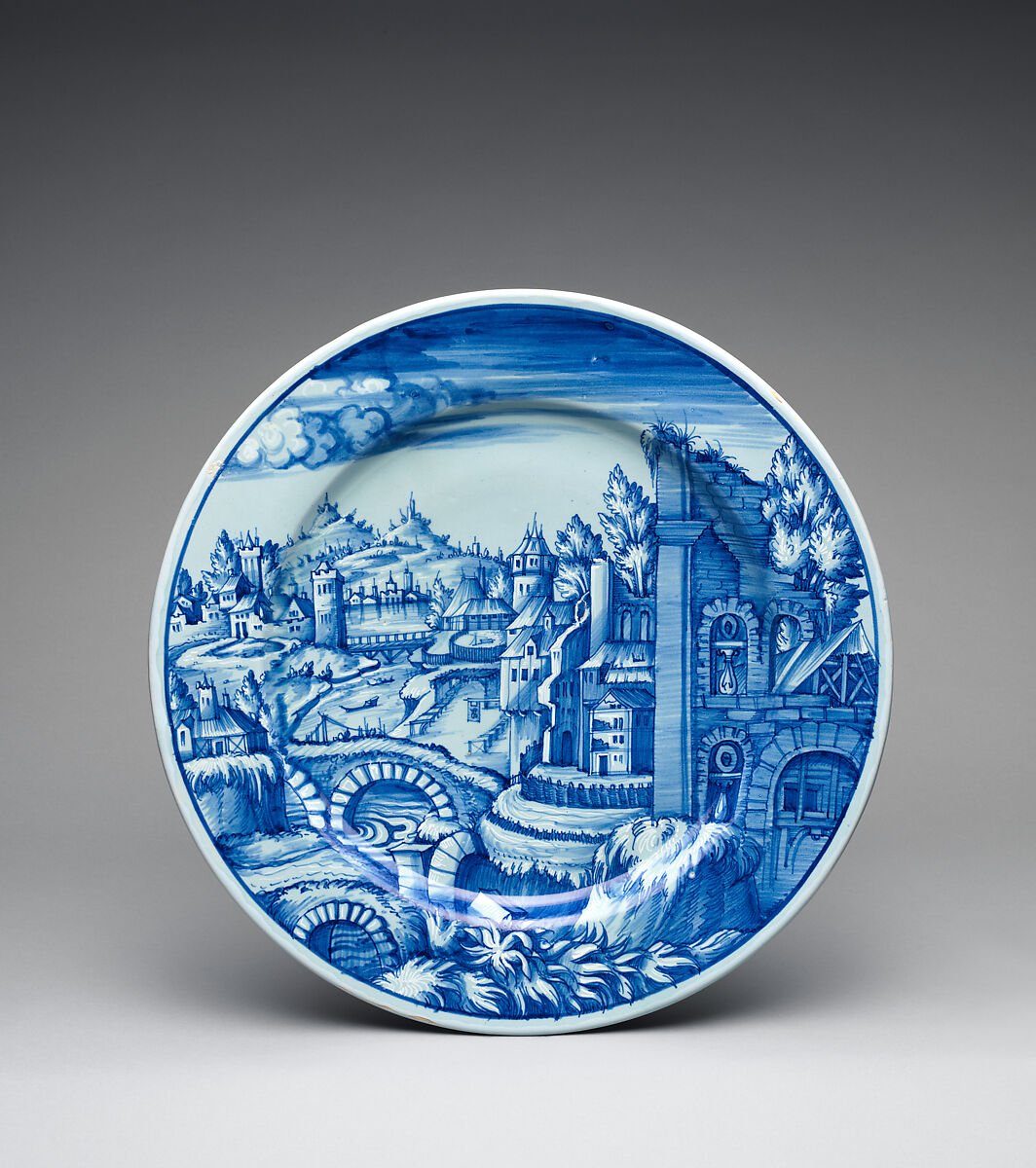 Dish with a Landscape, Jacopo da Pesaro (Italian, active Venice, 1507–ca. 1550), Tin-glazed earthenware painted with dark blue and white highlights on light blue berettino ground, Italian, Venice 