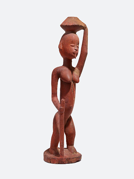 Female Vessel Bearer, Master of Tintam, Wood, red pigment, Dogon peoples 